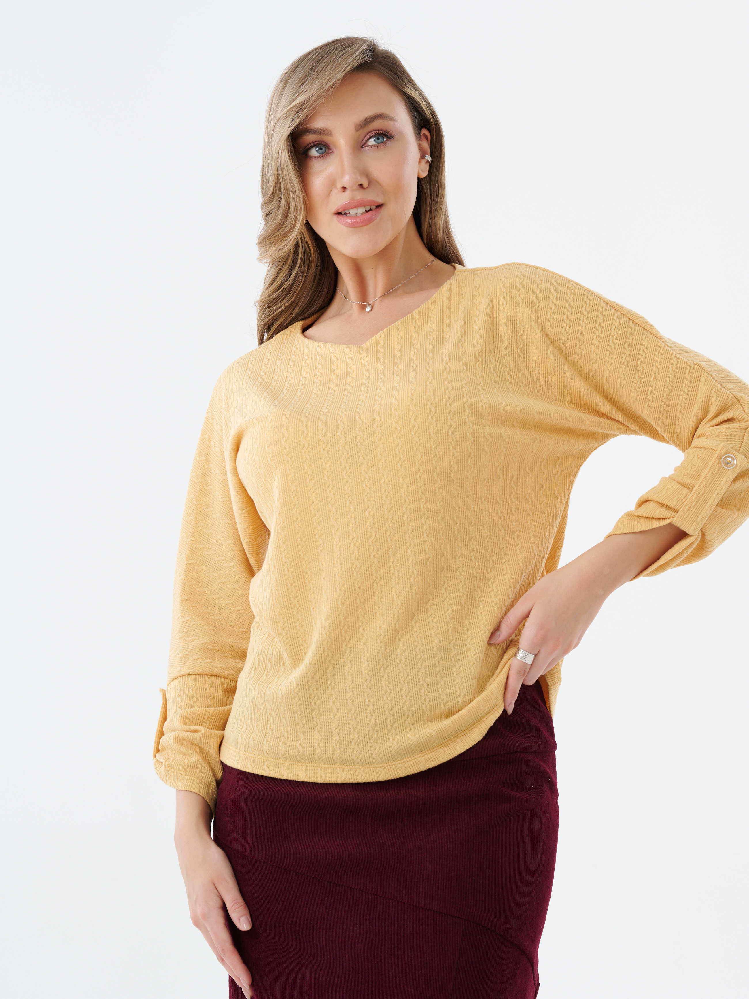 Блузка трикотажная с патами на рукавах желтая